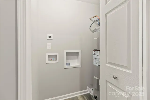 a room with chairs and window