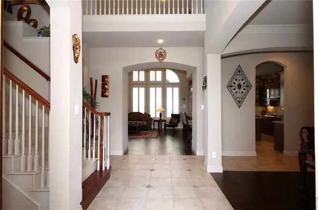 a view of entryway and livingroom with furniture