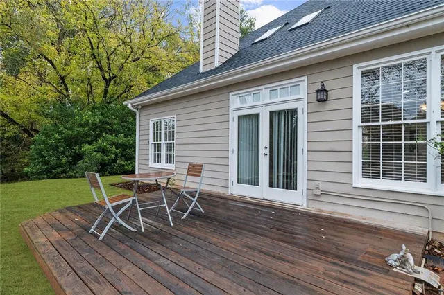 a outdoor view with a sitting space and garden