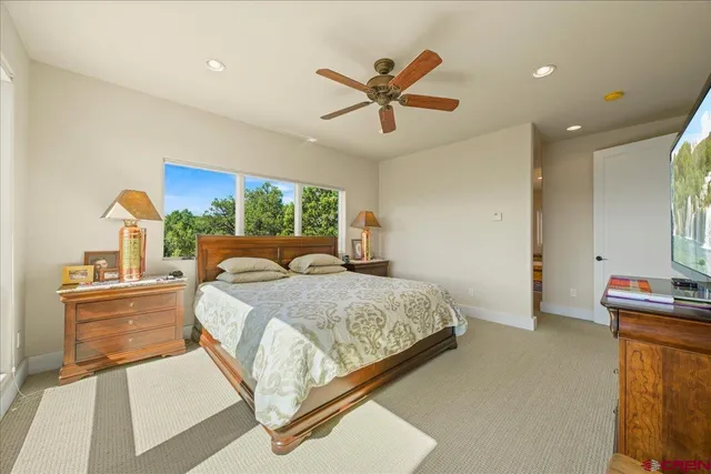 a room with furniture and a mirror