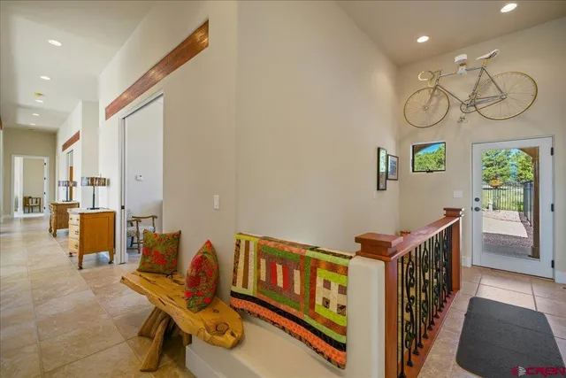 a kitchen with stainless steel appliances granite countertop a refrigerator and stove