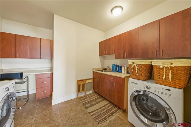 a large kitchen with lots of counter space and appliances