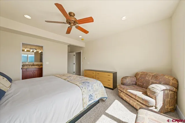 a bedroom with a bed and furniture