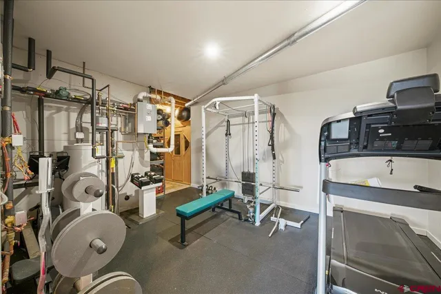 a view of a terrace with furniture and wooden floor