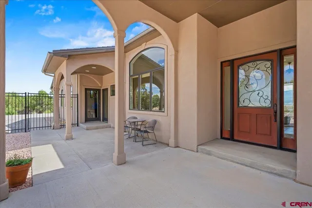 a view of a livingroom with furniture and window