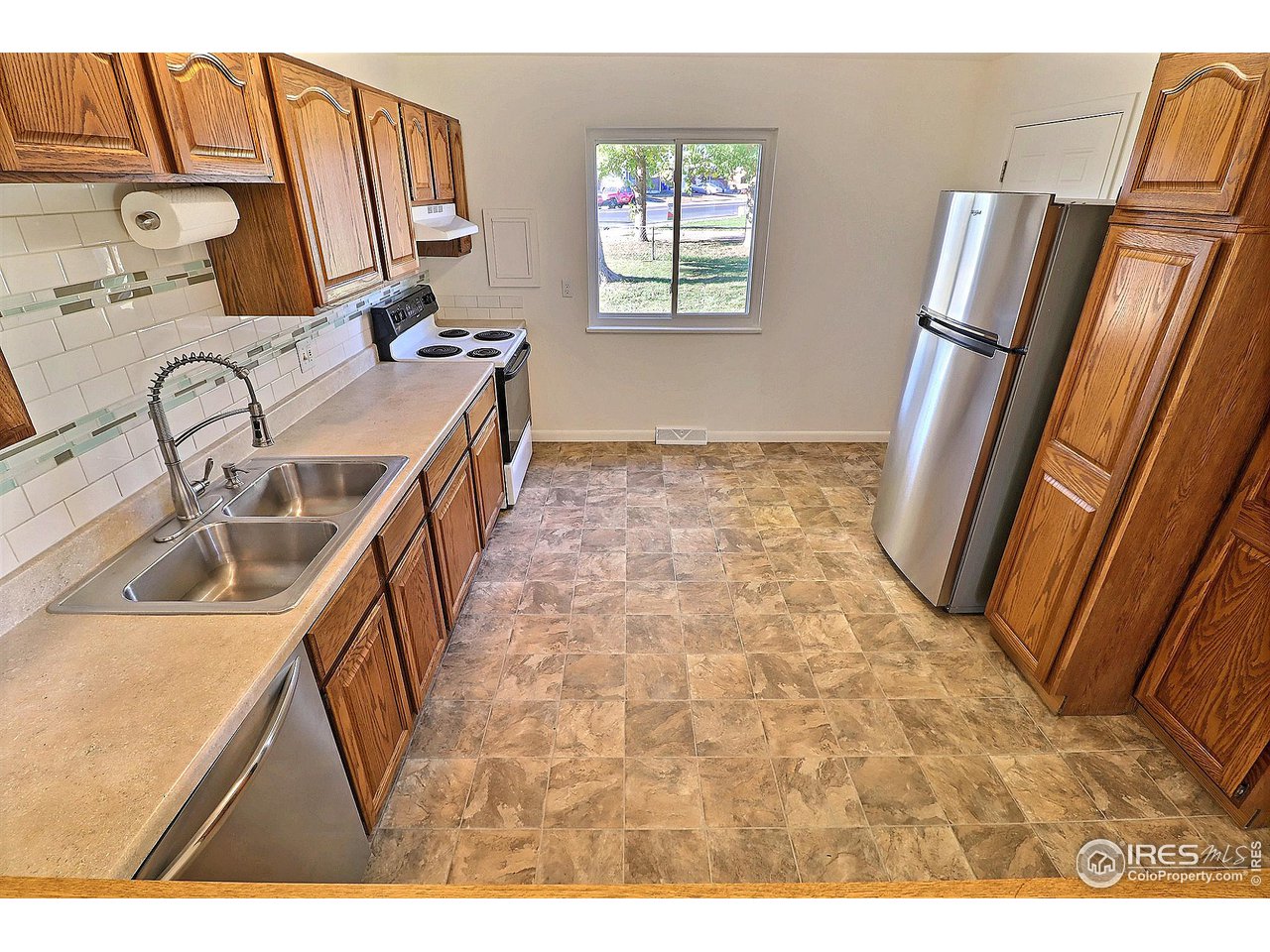 2002 26th Street Road Greeley, CO 80631 - Photo 13 of 38 with Nice Vinyl Flooring