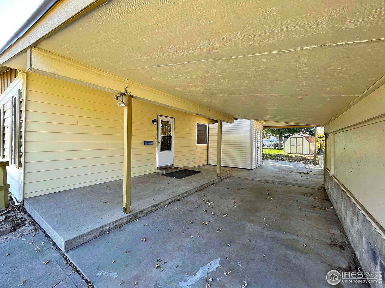 2002 26th Street Road Greeley, CO 80631 - Photo 3 of 38 Covered Car Port with Front Entrance