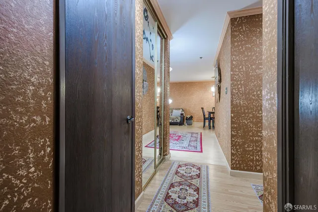a view of an entryway with furniture and front door