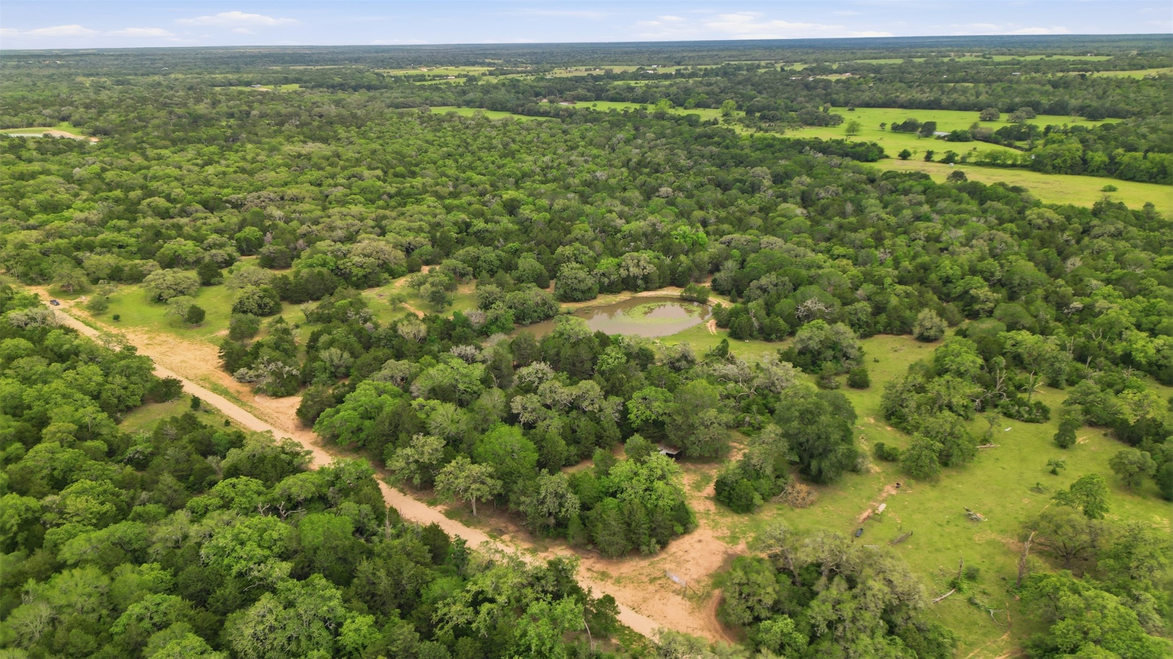 1165 Cr 213 Road Weimar, TX 78962 - Photo 12 of 50 a view of a green field with an outdoor space