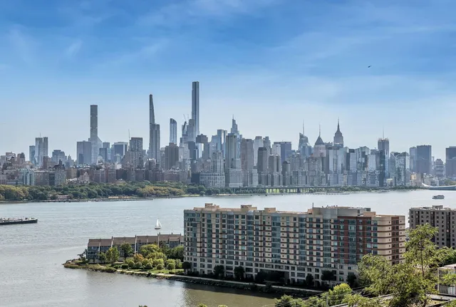 a view of a city with tall buildings