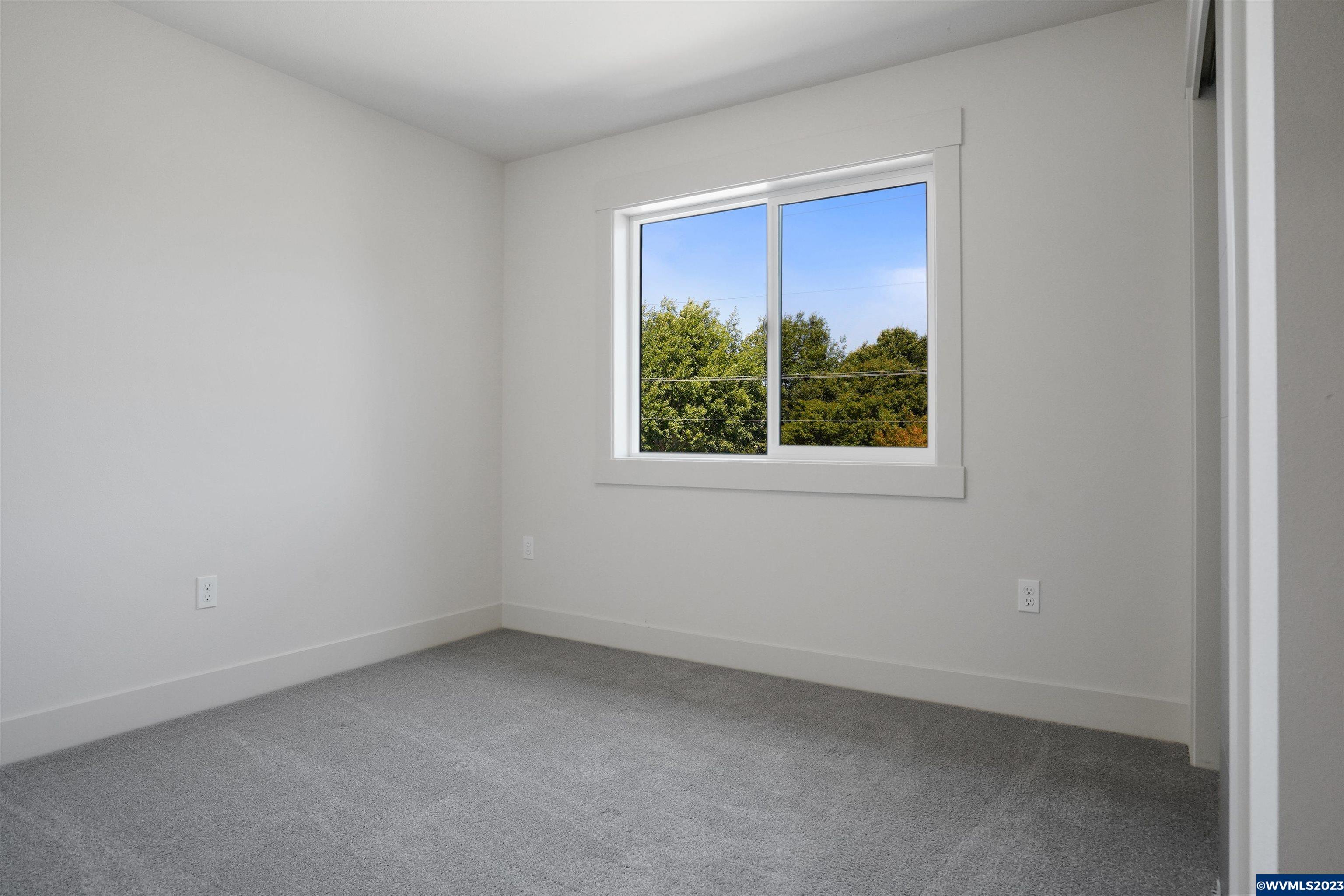 1956 Southwest 53rd Street Corvallis, OR 97333 - Photo 26 of 41 an empty room with windows