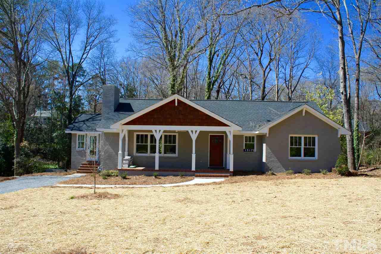 1317 Dixie Trail Raleigh, NC 27607 - Photo 1 of 25 Painted brick exterior with cedar accent on front.