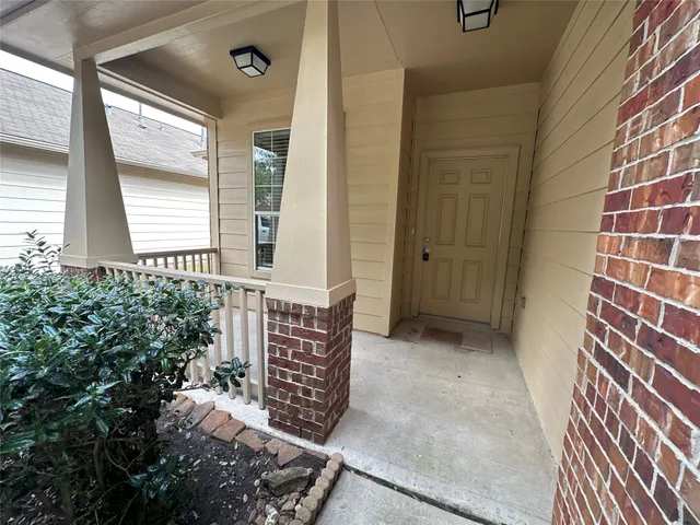 a view of a kitchen with a stove and cabinets