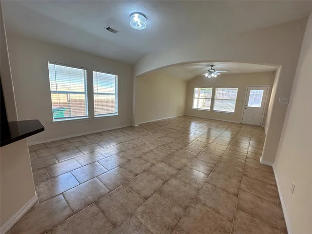 a view of an empty room and window