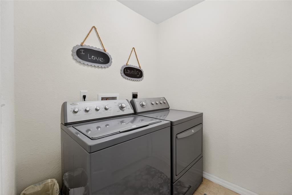 6032 Southwest 103rd Loop Ocala, FL 34476 - Photo 18 of 28 a utility room with dryer and washer