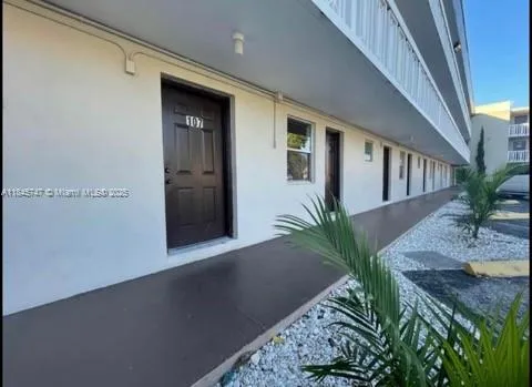 a view of building with yard