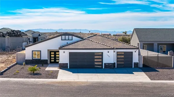 front view of a house with a street