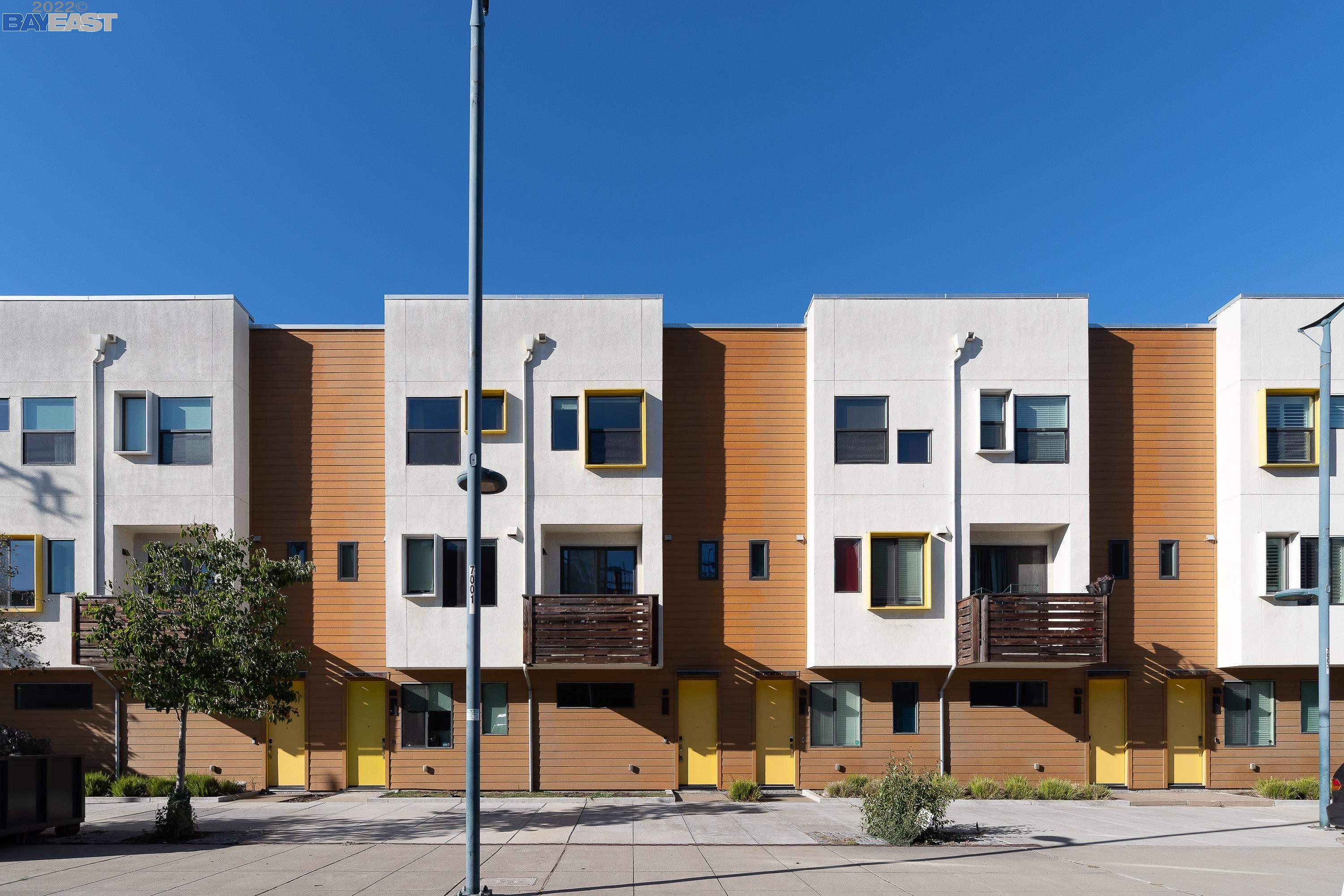 a city street lined with tall buildings