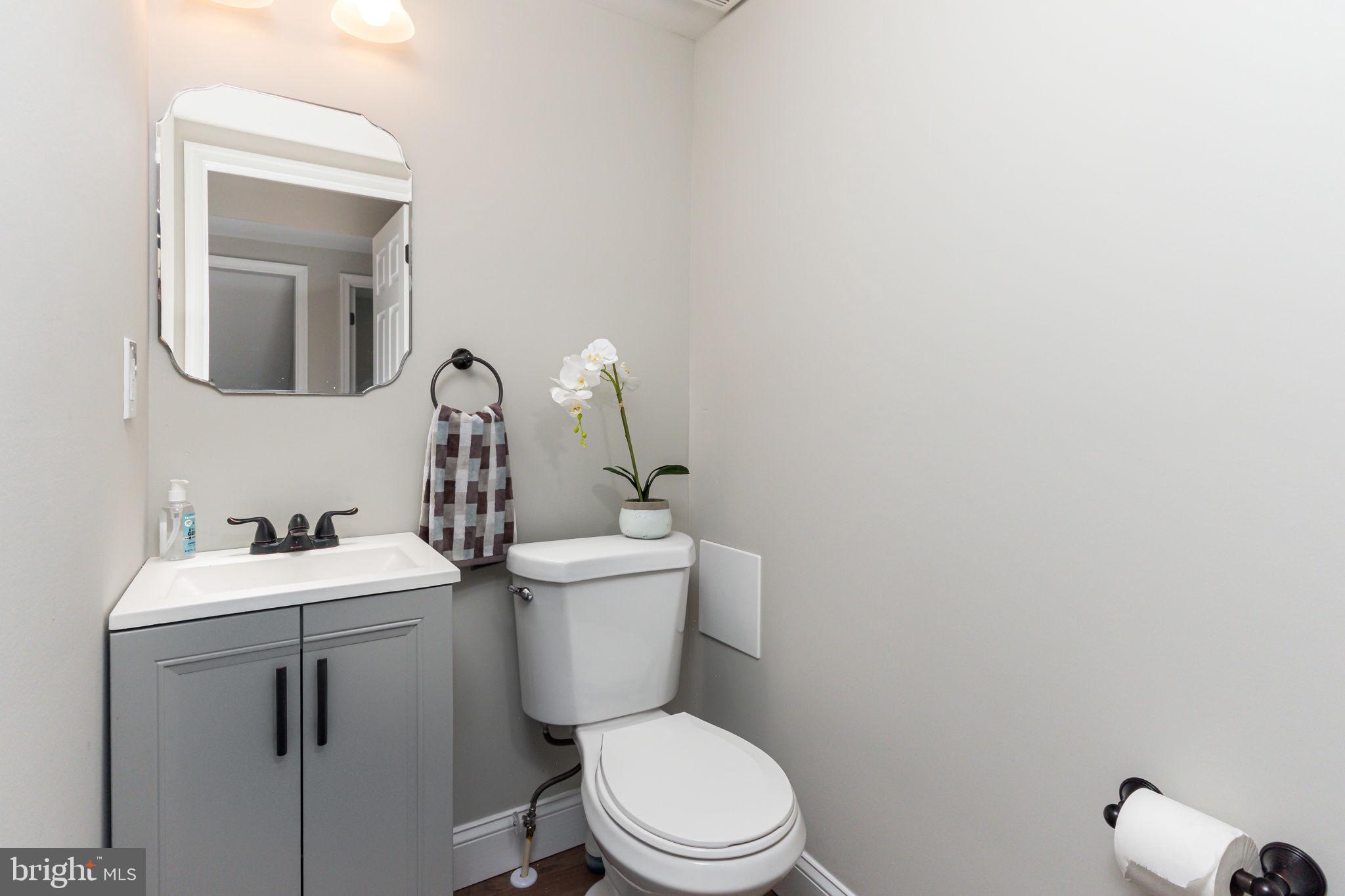 34 Evans Avenue Lutherville-Timonium, MD 21093 - Photo 14 of 36 Half-bath on main level