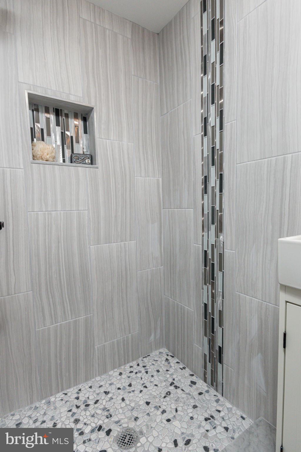 34 Evans Avenue Lutherville-Timonium, MD 21093 - Photo 29 of 36 Pebbled shower floor