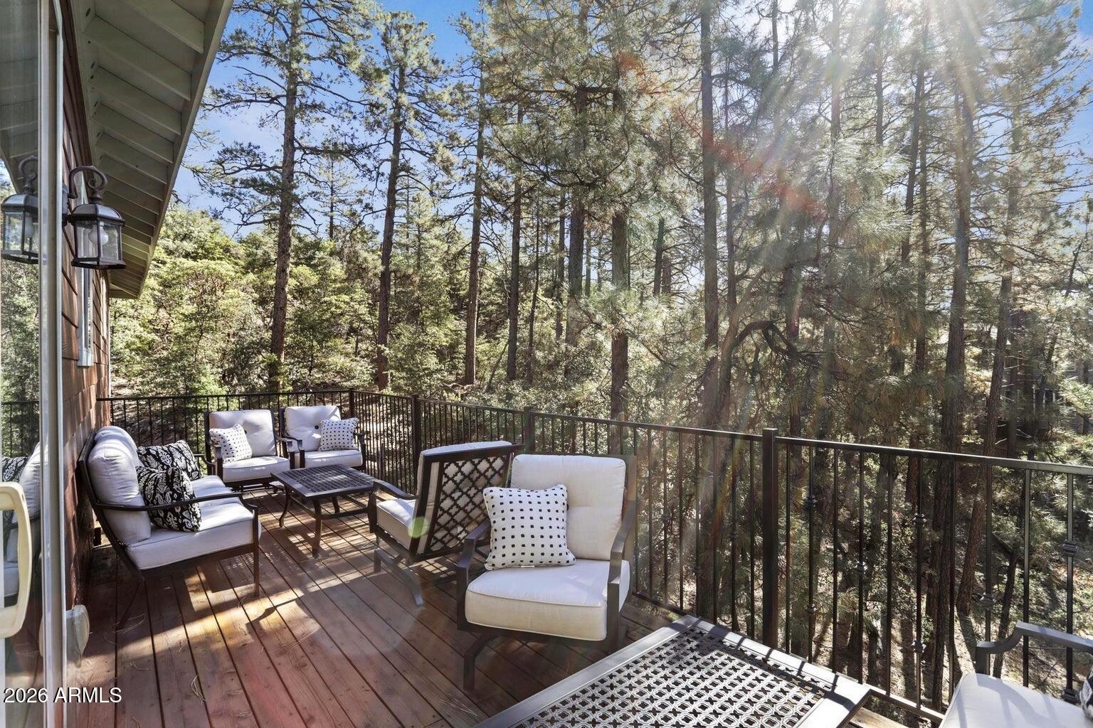 415 East Rim Estates Trail Payson, AZ 85541 - Photo 19 of 76 a view of balcony with wooden floor and outdoor seating