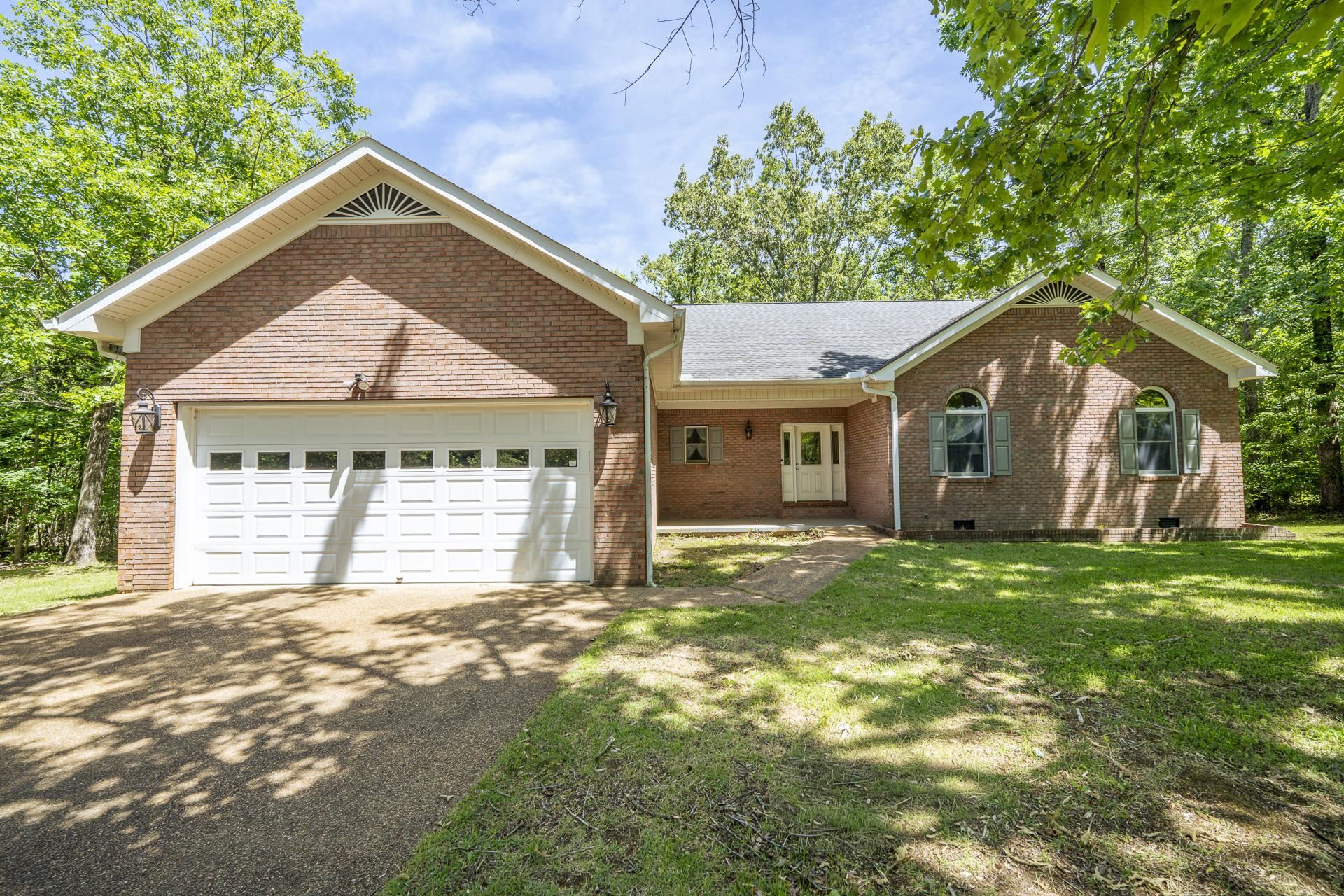 535 Old South Road Counce, TN 38326 - Photo 1 of 39 a front view of a house with a garden