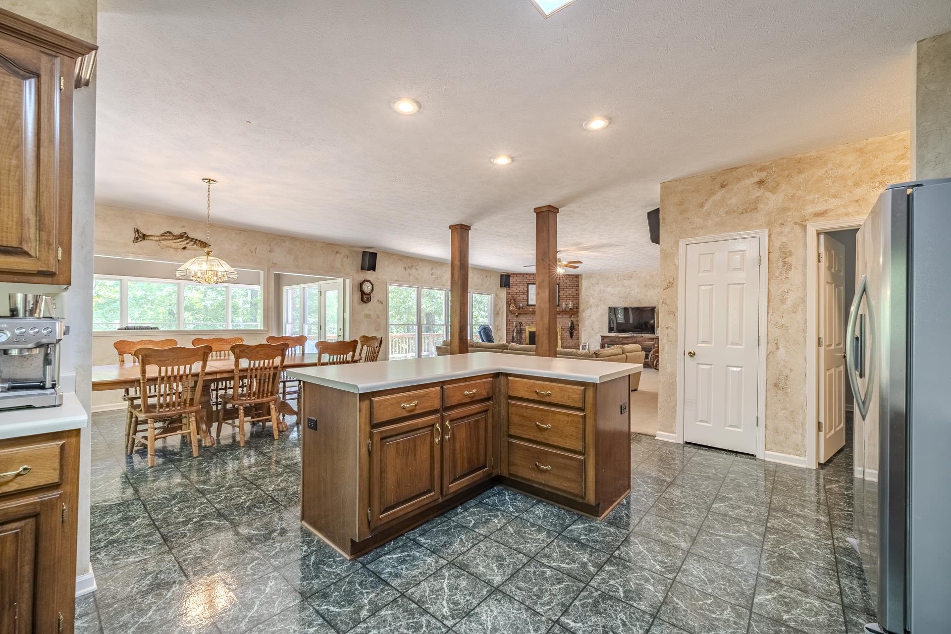 535 Old South Road Counce, TN 38326 - Photo 11 of 39 a open kitchen with stainless steel appliances granite countertop a stove and a refrigerator
