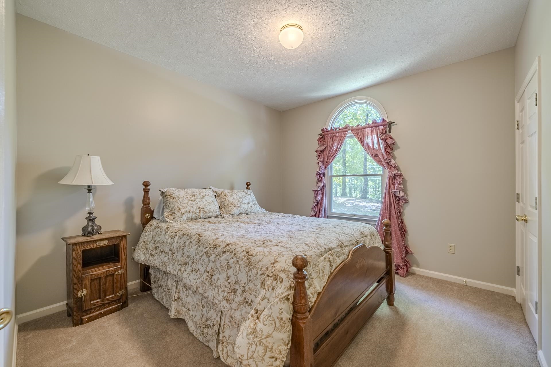 535 Old South Road Counce, TN 38326 - Photo 22 of 39 a bedroom with a bed and a window