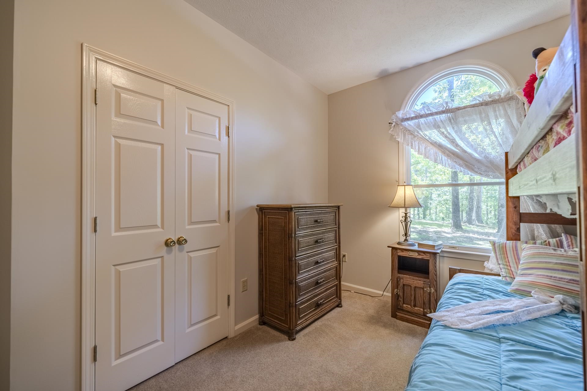 535 Old South Road Counce, TN 38326 - Photo 24 of 39 a view of a bedroom with furniture window and wooden floor