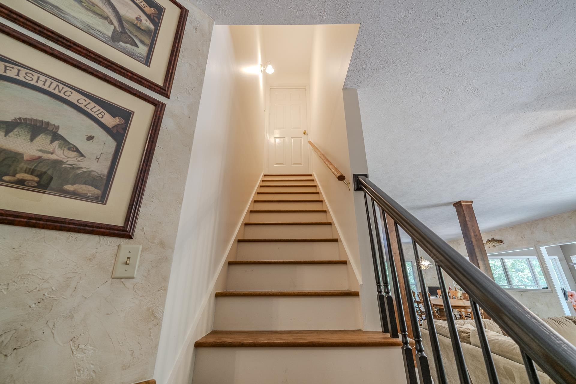 535 Old South Road Counce, TN 38326 - Photo 27 of 39 a view of staircase with wooden floor and white walls