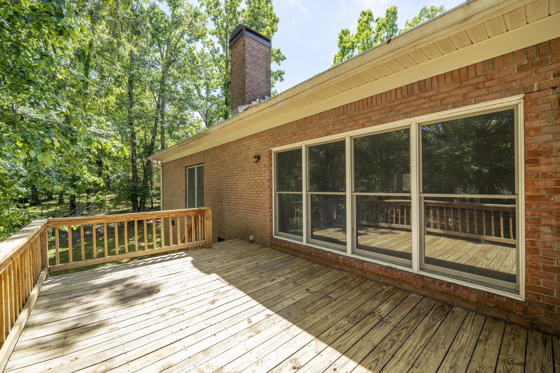 535 Old South Road Counce, TN 38326 - Photo 32 of 39 a view of deck with a large window and wooden floor