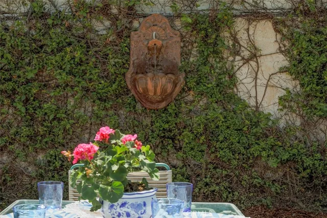 a view of a livingroom with furniture wooden floor and a window