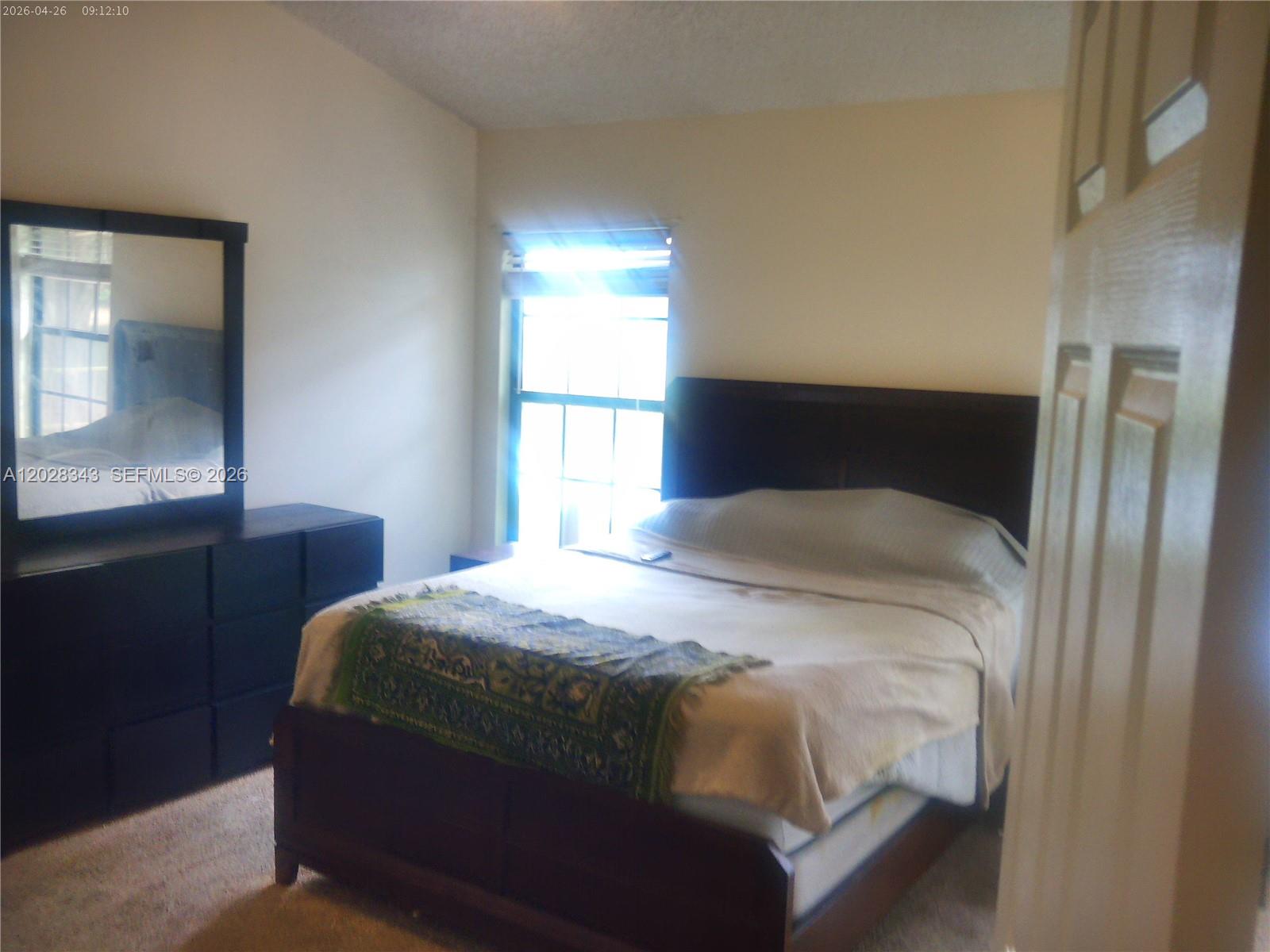 1641 Spring Oaks Lane Jacksonville, FL 32221 - Photo 28 of 44 a bedroom with a bed and a window