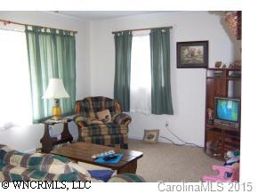 5064 Old Clyde Road Clyde, NC 28721 - Photo 6 of 6 a living room with furniture and a window