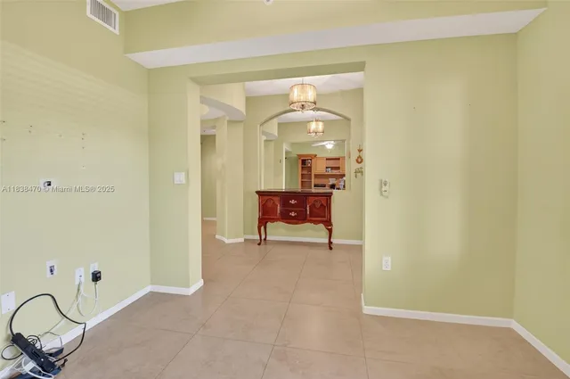 a bathroom with a toilet a sink and a mirror