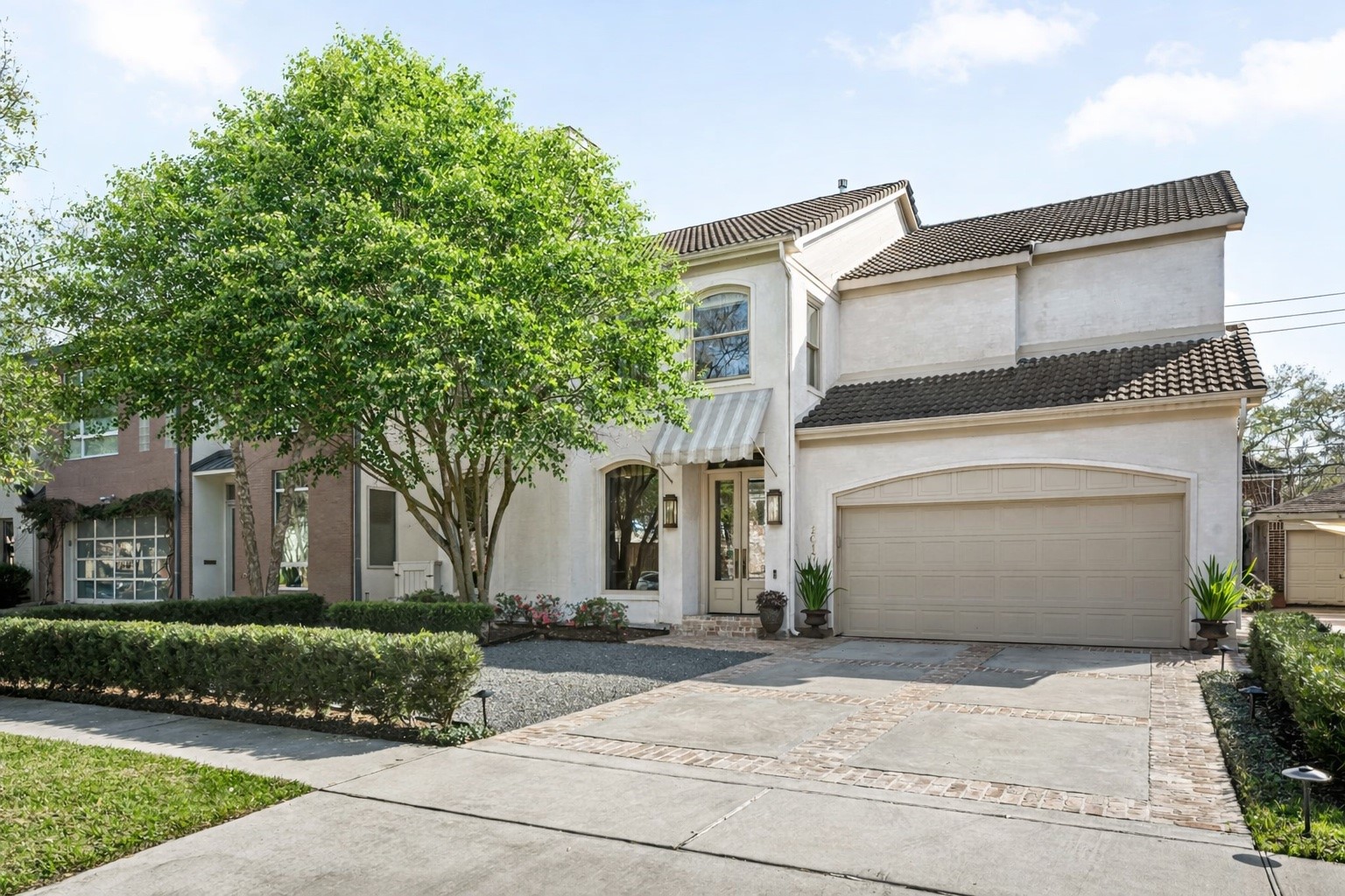 2017 Dryden Road Houston, TX 77030 - Photo 2 of 40 This home strikes that rare balance between architectural presence and everyday livability. From the dramatic, light-filled stair hall to the seamless flow between kitchen, sunroom, and gathering spaces, every room feels intentional and connected
