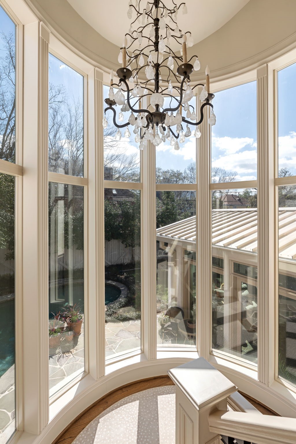 2017 Dryden Road Houston, TX 77030 - Photo 24 of 40 The stairway doesn't simply connect levels - it stages an experience. Wrapped in a graceful curve and framed by soaring walls of glass, it turns a daily routine into something theatrical.