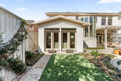 a white building with glass door