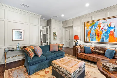 a living room with furniture and a couch