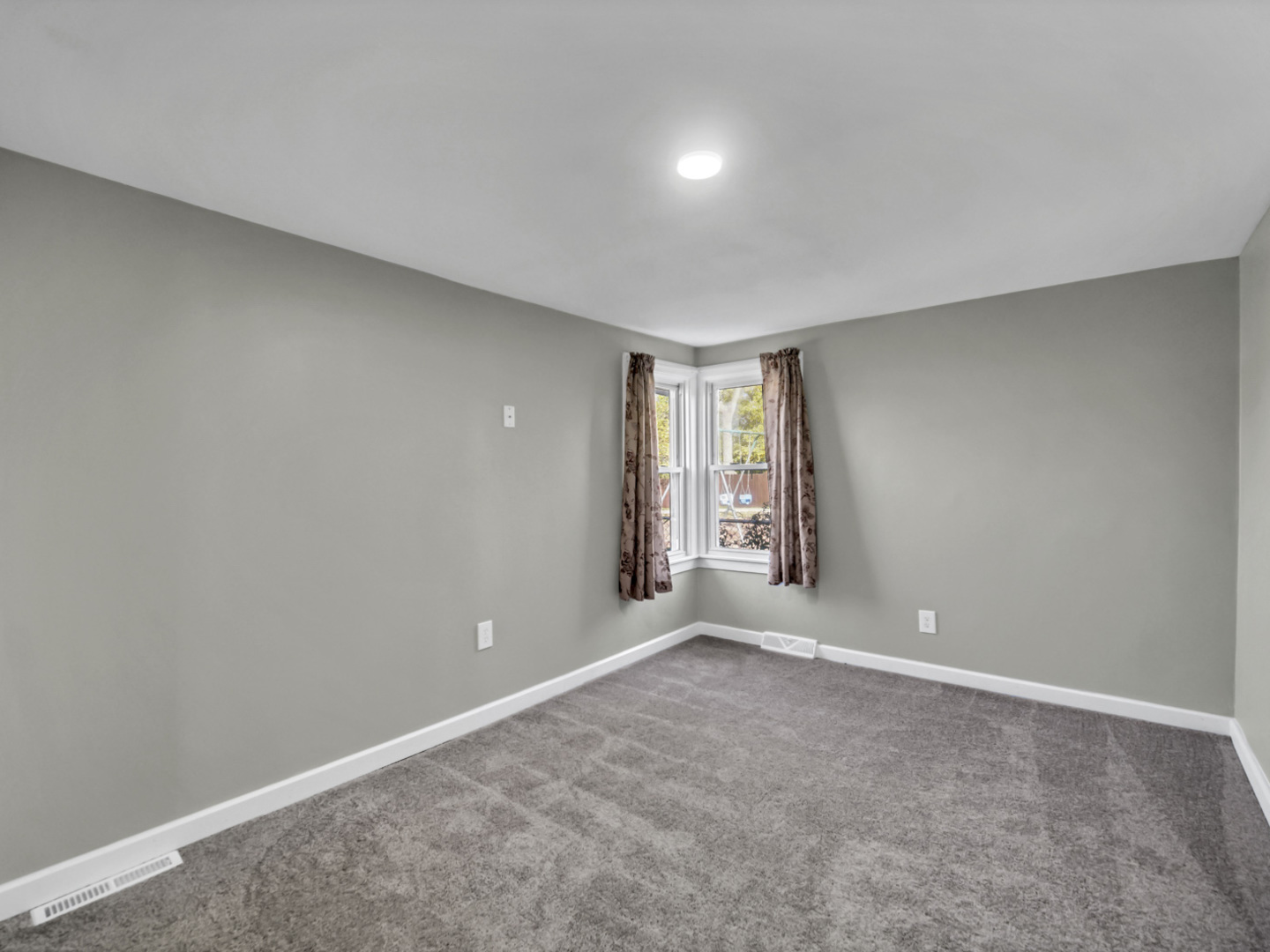 1820 Tomahawk Trail Round Lake Heights, IL 60073 - Photo 14 of 23 a view of an empty room with window