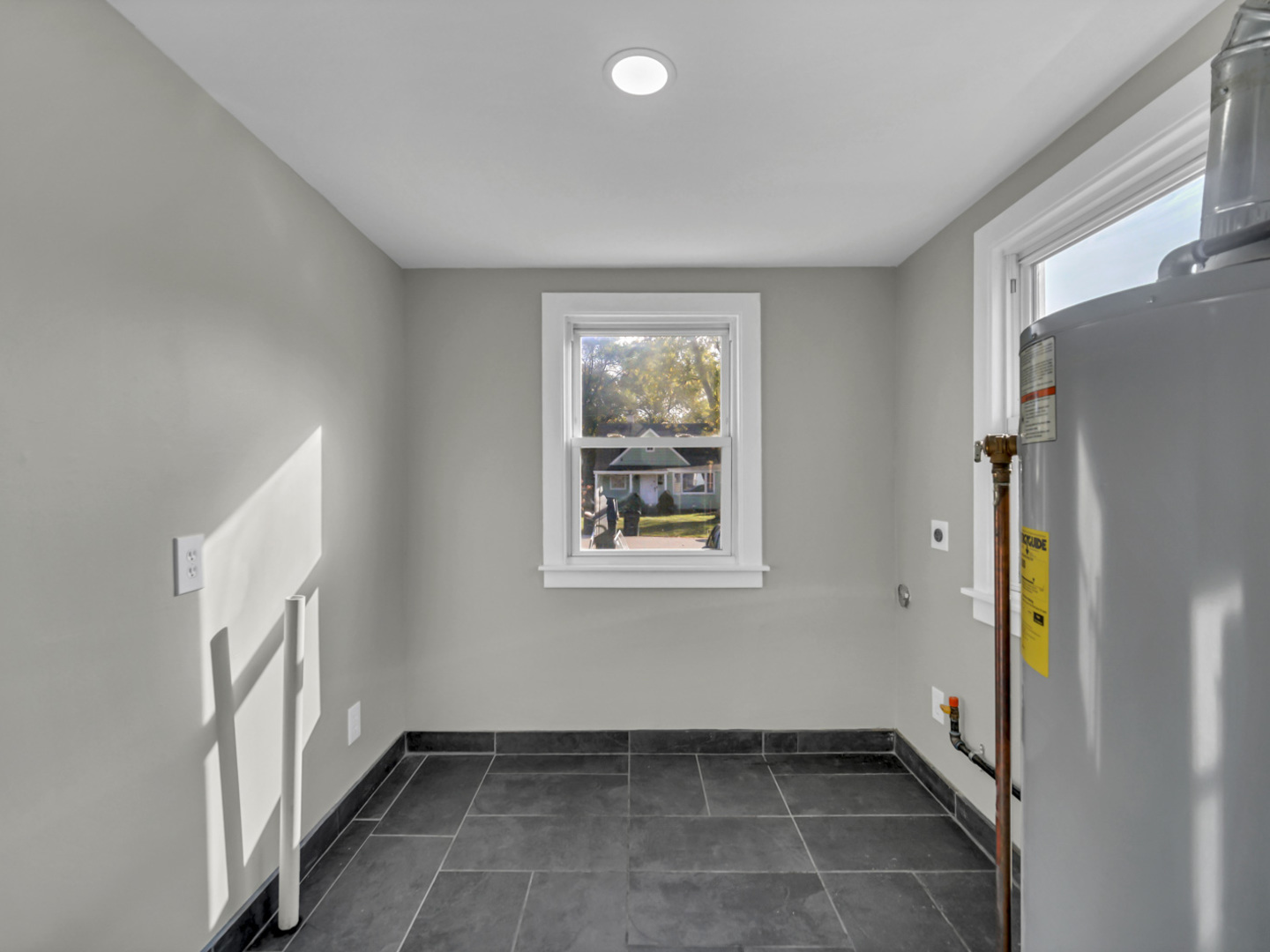 1820 Tomahawk Trail Round Lake Heights, IL 60073 - Photo 15 of 23 a view of an empty room with a window