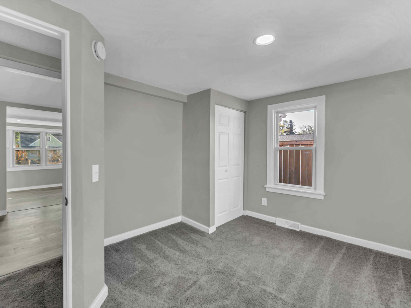 1820 Tomahawk Trail Round Lake Heights, IL 60073 - Photo 17 of 23 an empty room with windows and closet