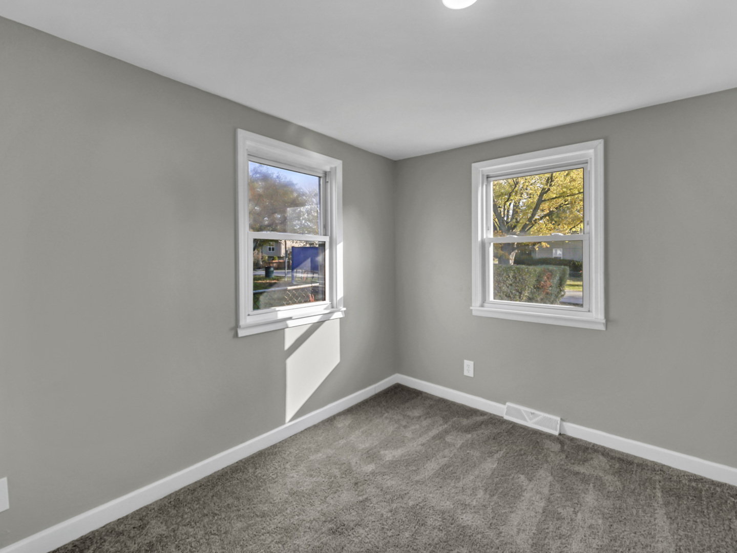 1820 Tomahawk Trail Round Lake Heights, IL 60073 - Photo 19 of 23 a view of an empty room with a window