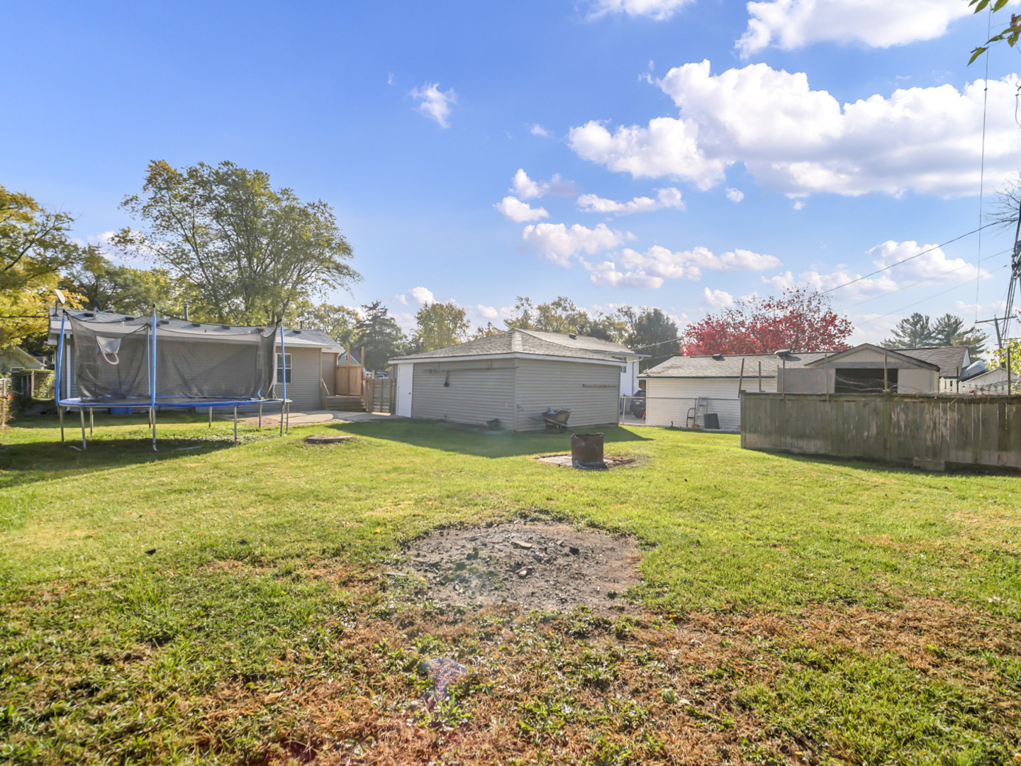 1820 Tomahawk Trail Round Lake Heights, IL 60073 - Photo 21 of 23 a view of a swimming pool with a yard and a large tree