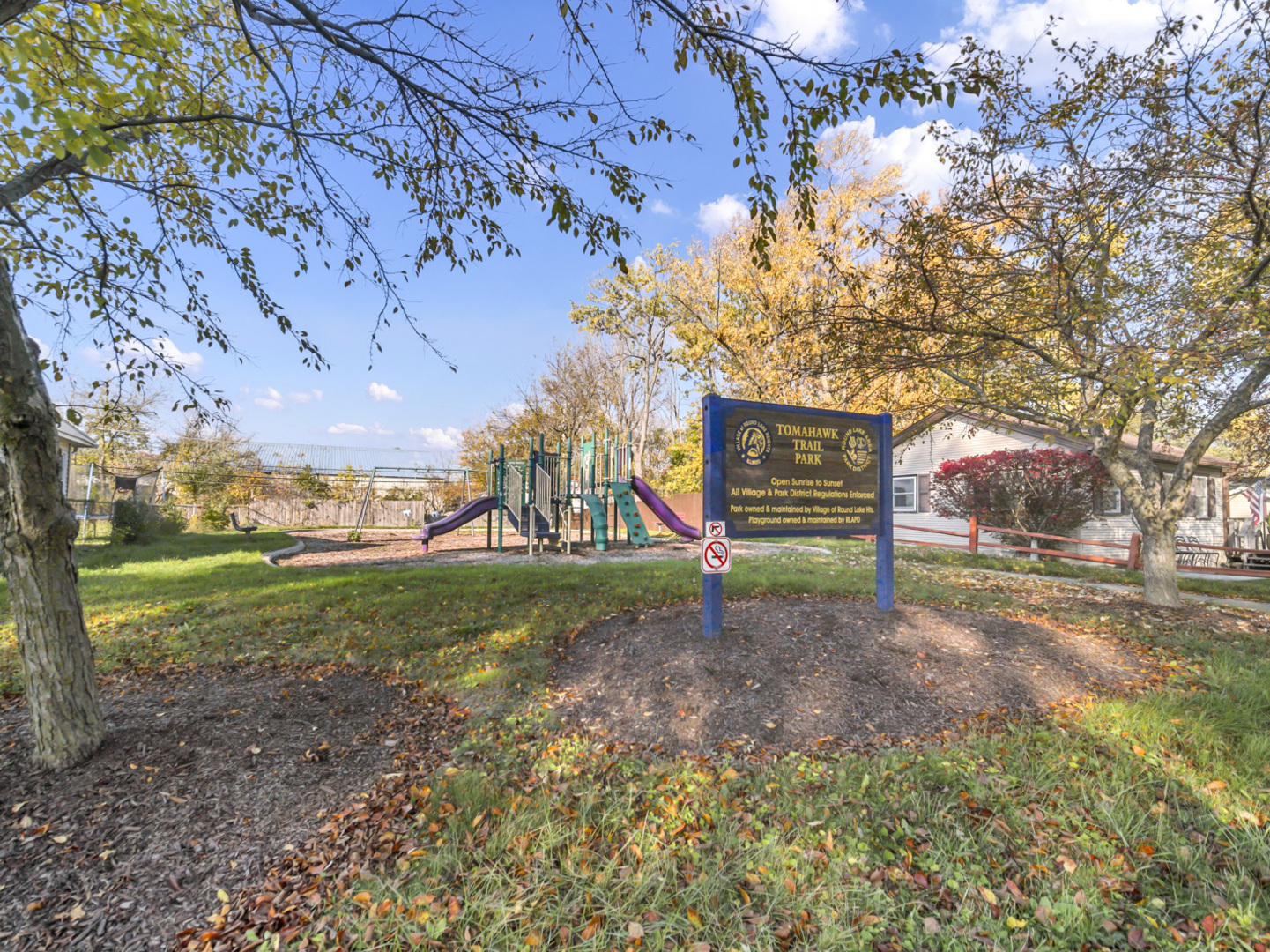 1820 Tomahawk Trail Round Lake Heights, IL 60073 - Photo 3 of 23 a view of a park with a tree