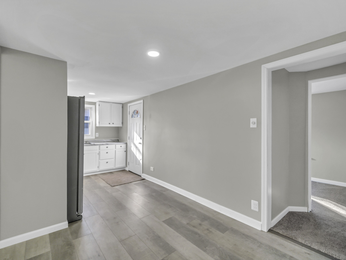1820 Tomahawk Trail Round Lake Heights, IL 60073 - Photo 7 of 23 a view of entryway with wooden floor