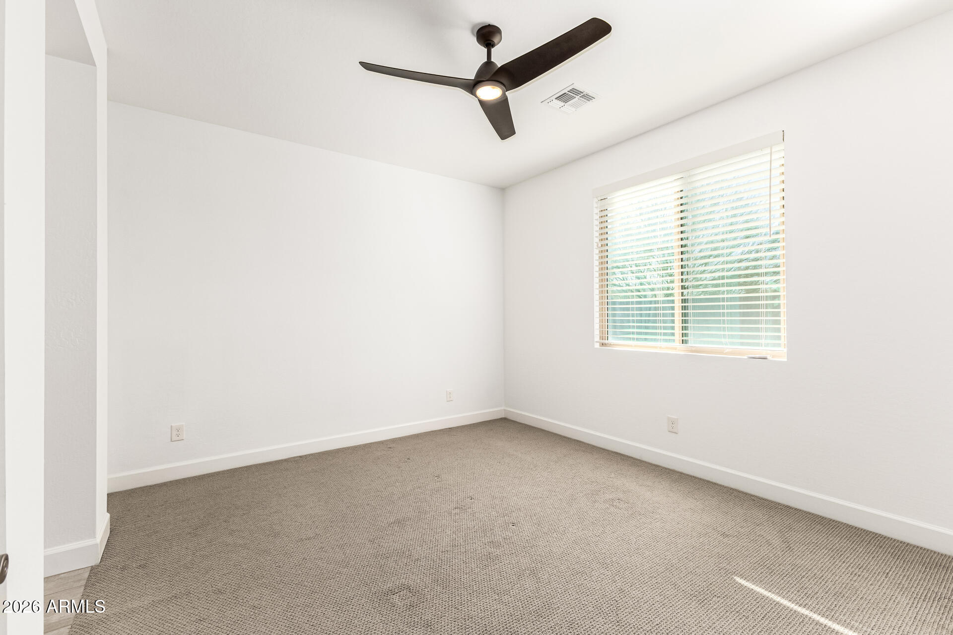 735 East Marblewood Way Phoenix, AZ 85048 - Photo 16 of 35 an empty room with a window
