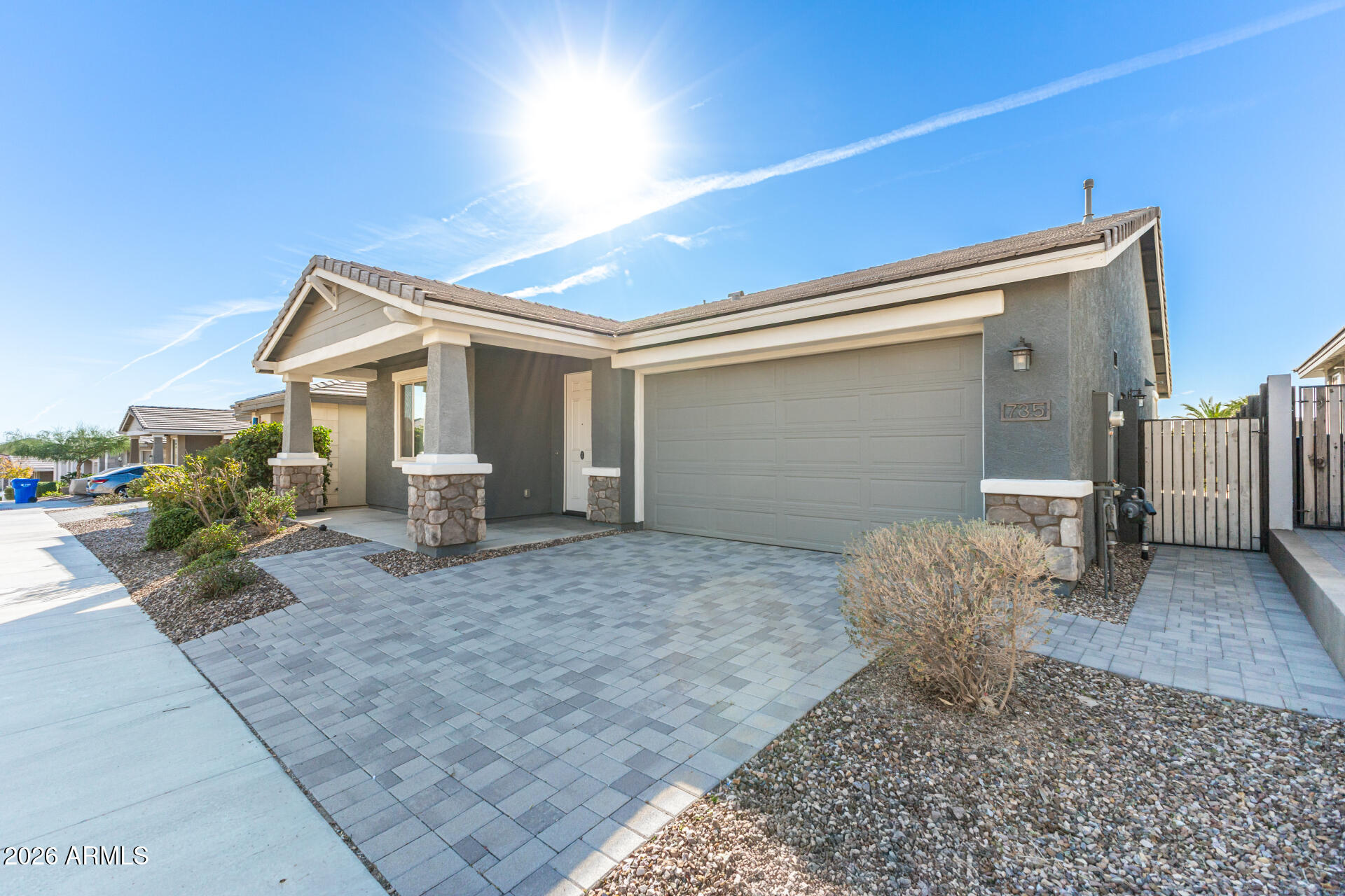735 East Marblewood Way Phoenix, AZ 85048 - Photo 2 of 35 a front view of a house with garden