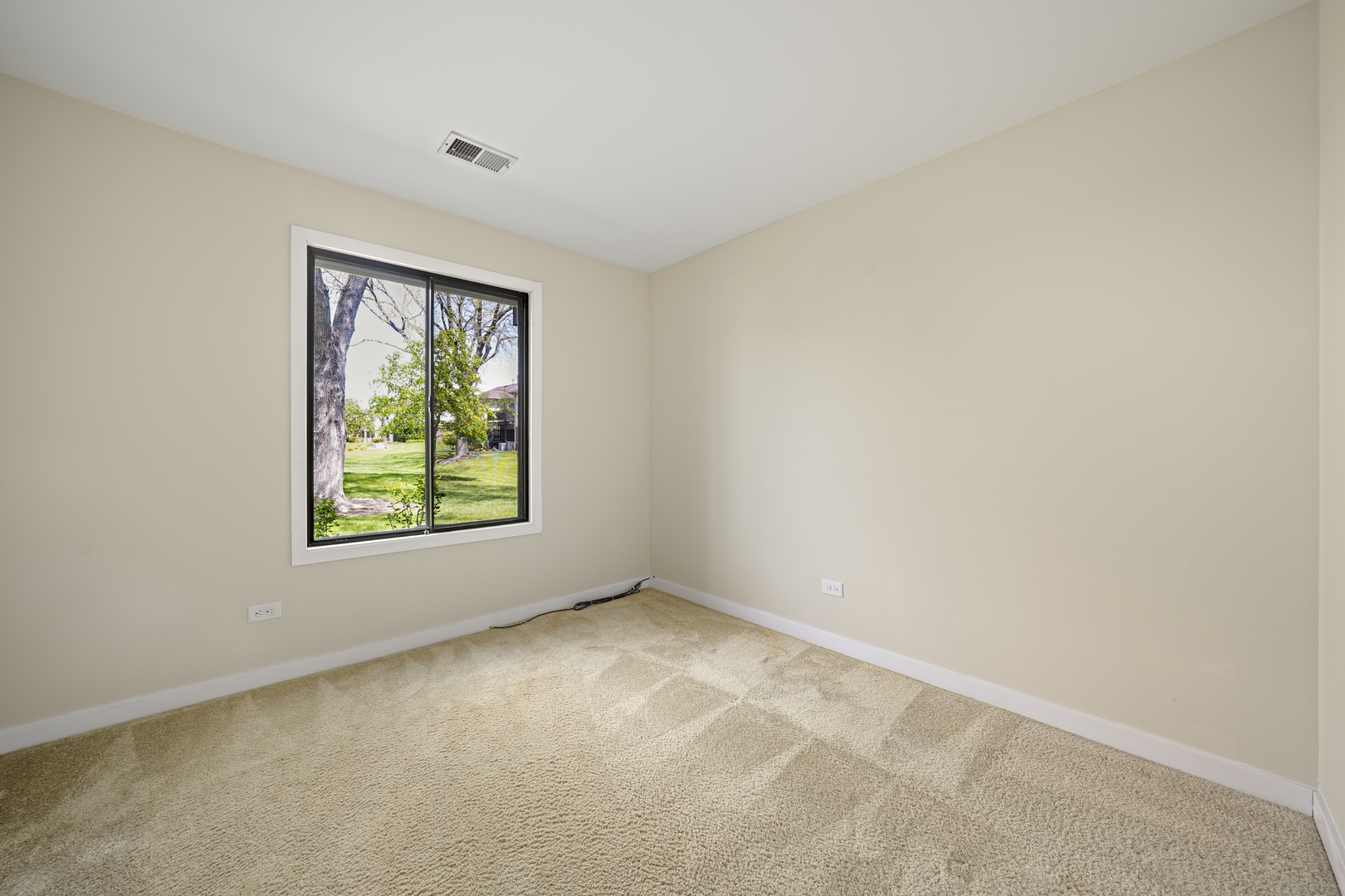 924 Coach Road, Unit 1 Palatine, IL 60074 - Photo 11 of 23 an empty room with windows