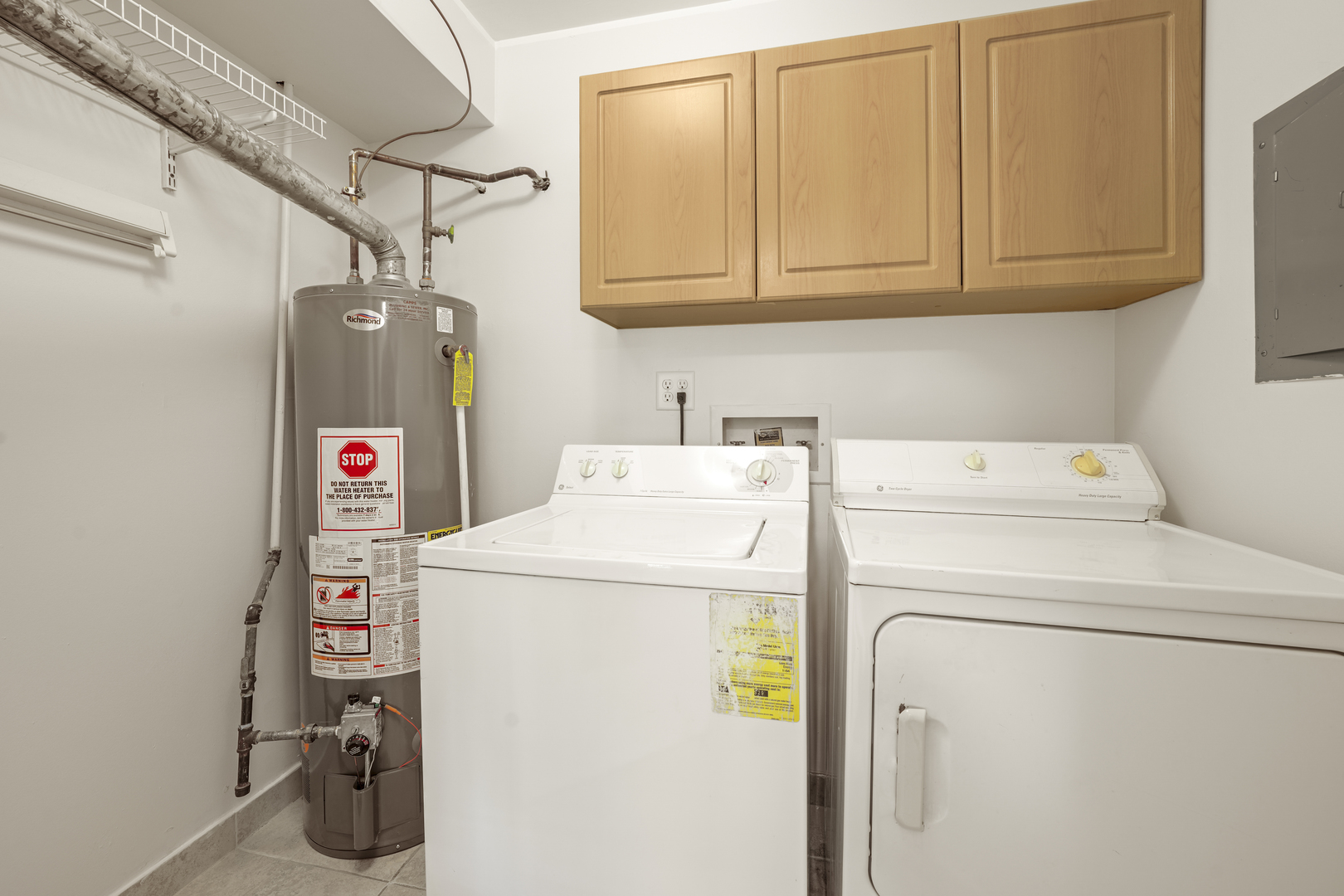 924 Coach Road, Unit 1 Palatine, IL 60074 - Photo 18 of 23 a utility room with dryer and washer